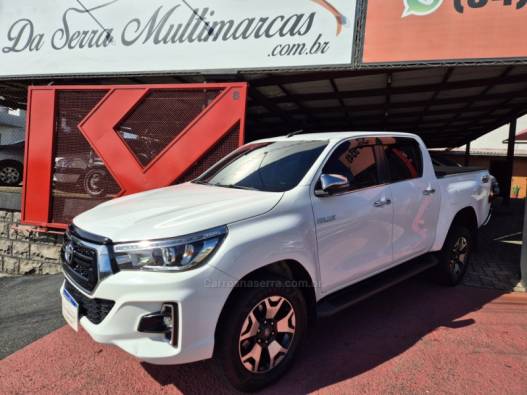 TOYOTA - HILUX - 2018/2019 - Branca - R$ 209.900,00